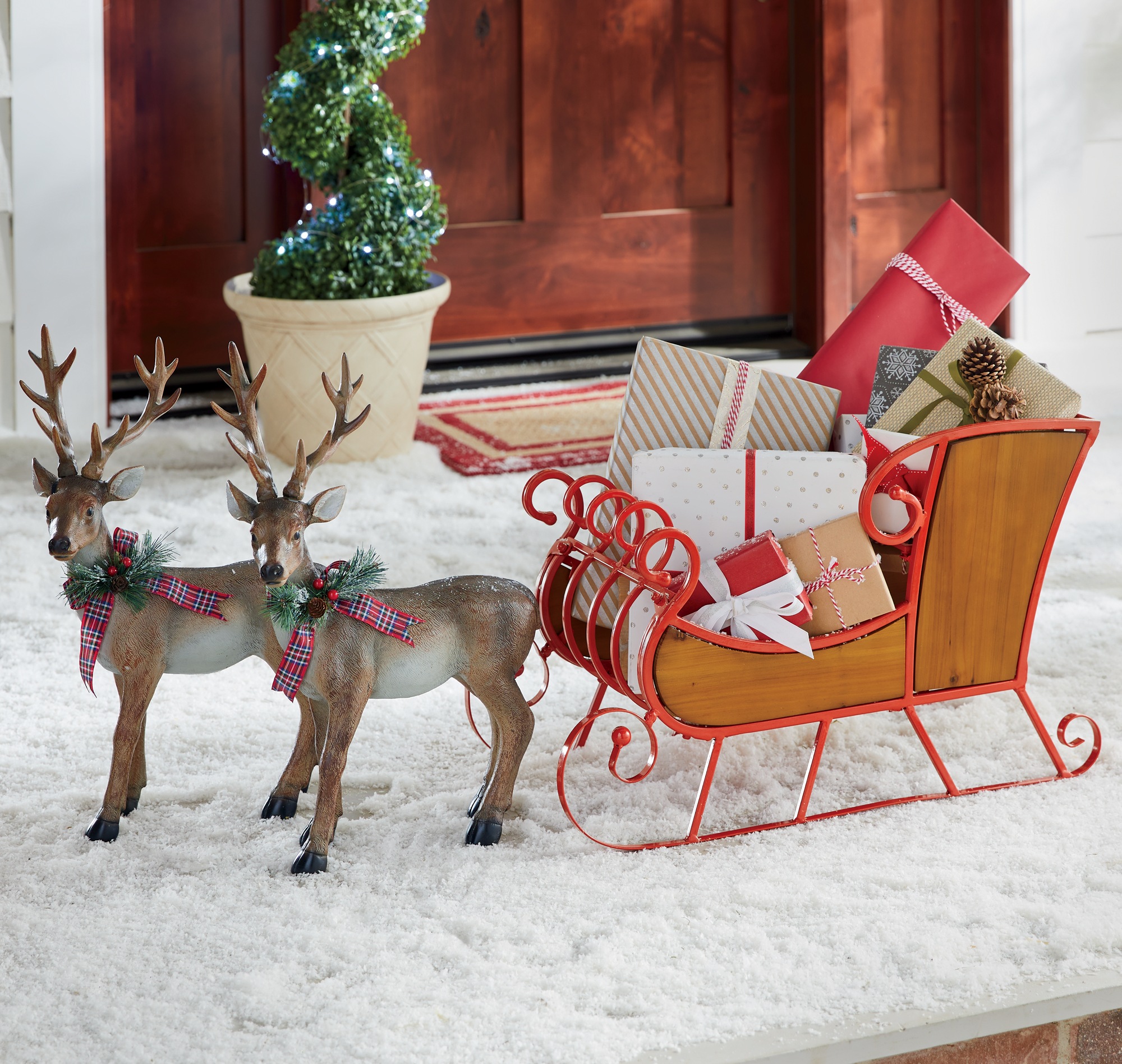 Santa’s sleigh and reindeer metal mantle decor